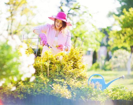 Removing weeds and debris during garden clearance in Riddlesdown